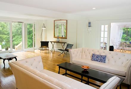 The spacious sitting room at the Nobnocket with airy patio doors open wide